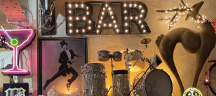 Cocktail drum kit and bar sign