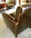 Stunning French leather chair with solid Macassar panels and feet