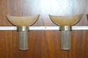 Two torch shaped sconces