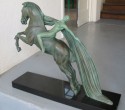 1930's deco sculpture of a woman on a horse
