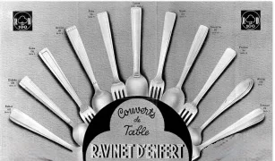 Vintage advertisement displaying an array of Ravinet d’Enfert table cutlery arranged in a fan shape