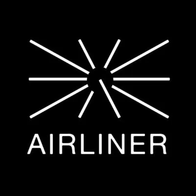 White symmetrical radiating lines in a circular pattern above the word AIRLINER on a black background