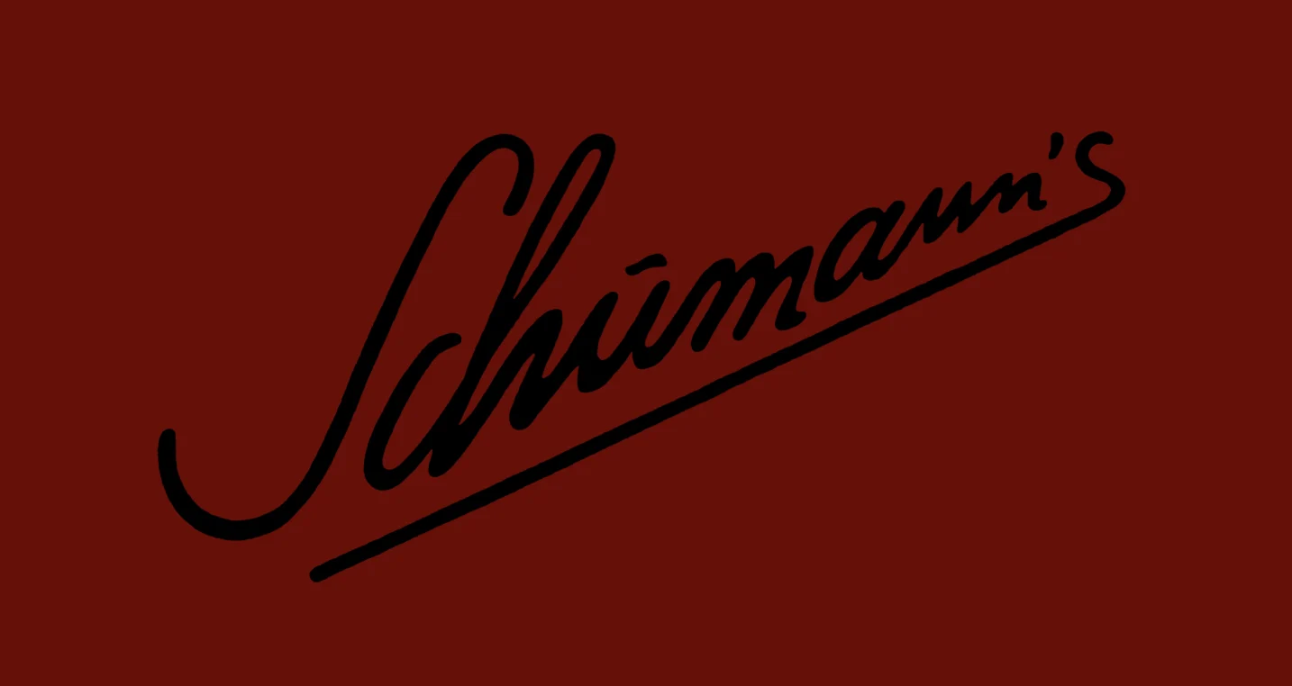 Black cursive text 'Schwamm's' on a dark red background