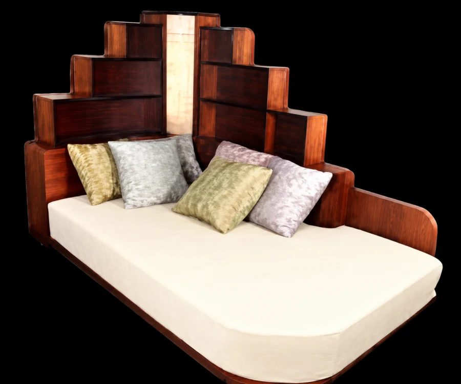 Modern wooden daybed with stepped backrest and decorative pillows