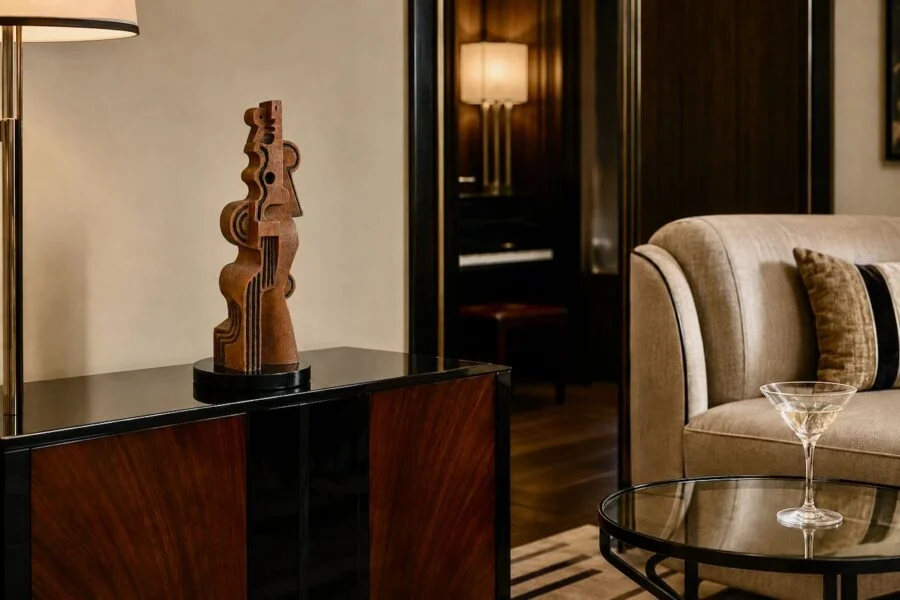Modern wooden abstract sculpture on black sideboard in elegant living room